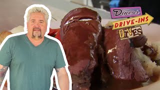 Guy Fieri Eats CanadianStyle Roast Beef amp Gravy Dinner  Diners DriveIns and Dives  Food Network [upl. by Thaddaus]