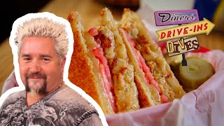 Guy Fieri Tries CRAB CAKE Grilled Cheese  Diners Driveins and Dives with Guy Fieri  Food Network [upl. by Hezekiah]