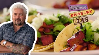 Guy Fieri Eats Some OUTSTANDING Tacos Al Pastor  Diners DriveIns and Dives  Food Network [upl. by Ad4]